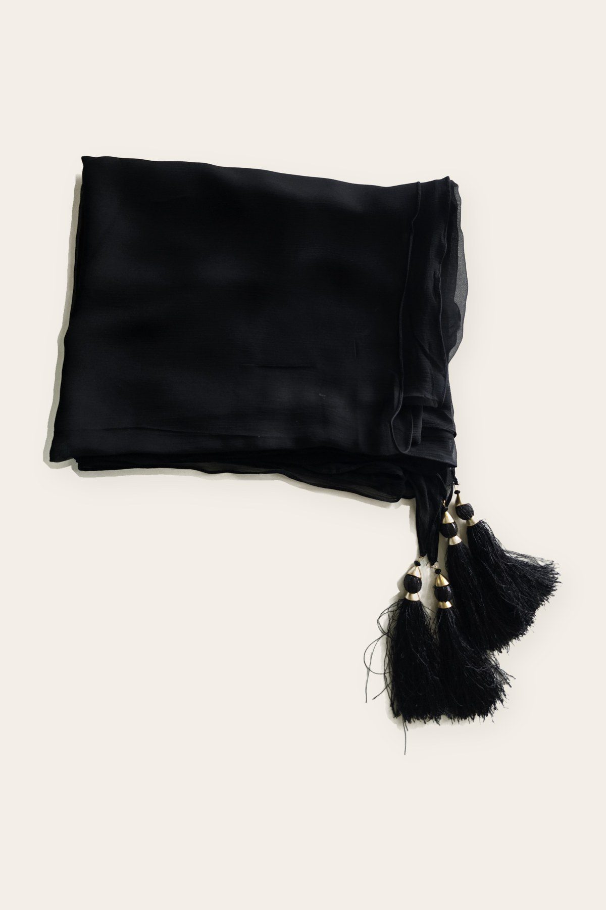 Black crinkle dupatta with resham tassels by Éléganza