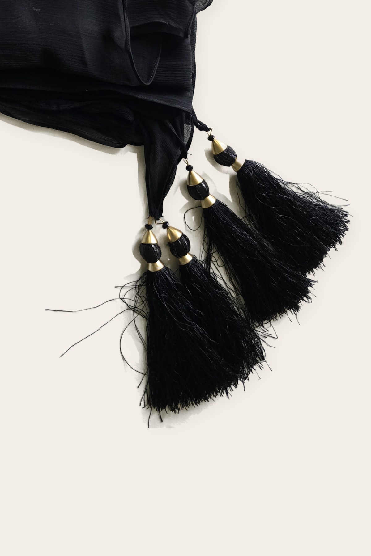 Black crinkle dupatta with resham tassels by Éléganza