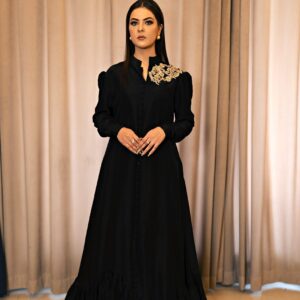 Black Éléganza Silk frock lehenga with hand-made gold shoulder motif and puff sleeves, front view