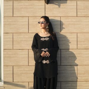 Black Russian silk kurta with hand-embroidered gold motifs and balloon pants, front view