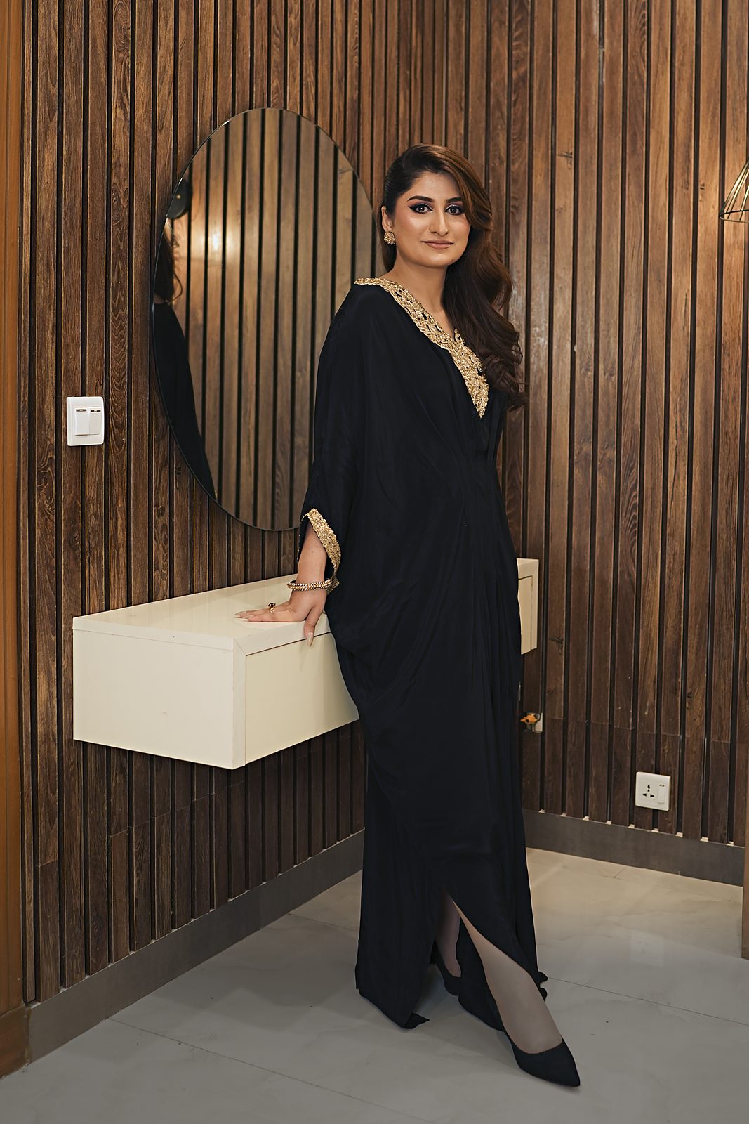 Black Russian silk kaftan showing the 15-inch side slit