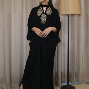 Black micro velvet kaftan with hand-embroidered kora dabka motifs at the keyhole neck, front view